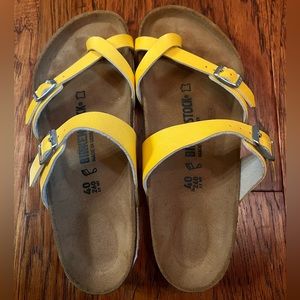 Fun yellow Birkenstocks worn less than 5 times!